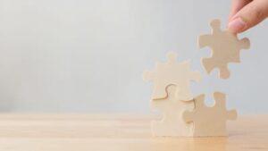 Puzzle pieces fitting together